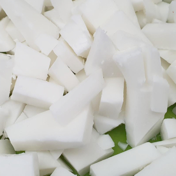 Cutting the soap base.